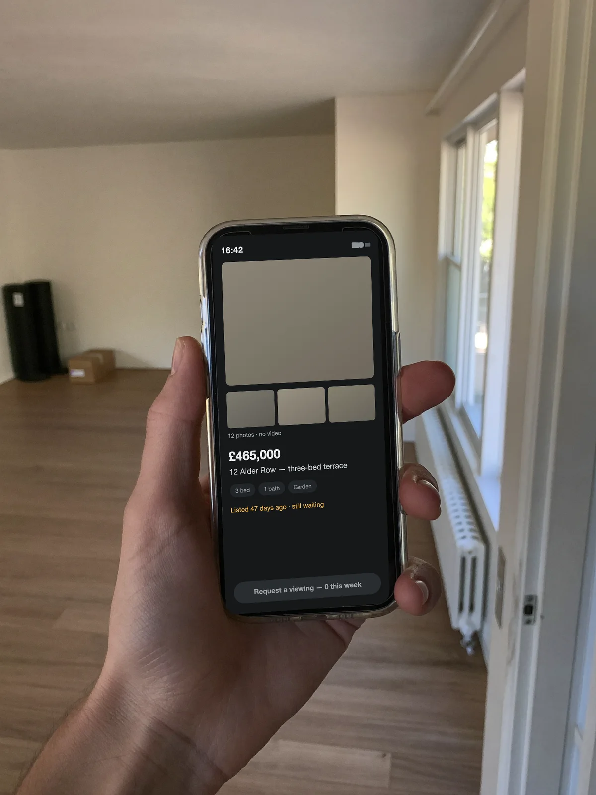 Standing in the empty house, the listing on a phone — 47 days on the portal, twelve photos, no film.